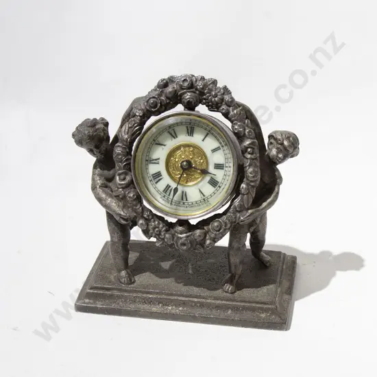 Cast Metal American Ansonia Clock Decorated with Cherubs