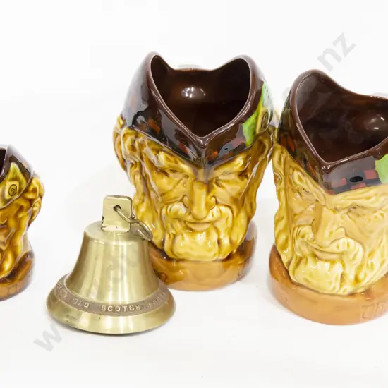 Three Wade McCallum Whisky Jugs of Sizes together with Scotch Whisky Bell