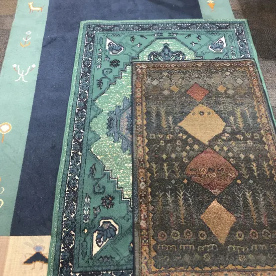 Three Machine Made Floor Rugs of Sizes