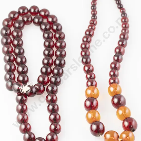 Two Edwardian Cherry Amber Bead Necklaces