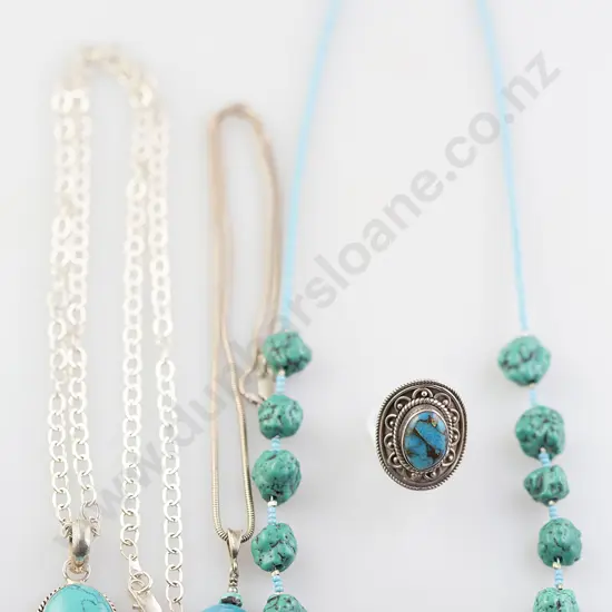 Two Turquoise Pendants