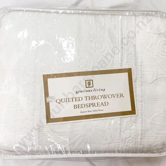 Queen Quilted Throw Over Bedspread