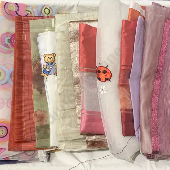 Large Quantity of Material Pieces