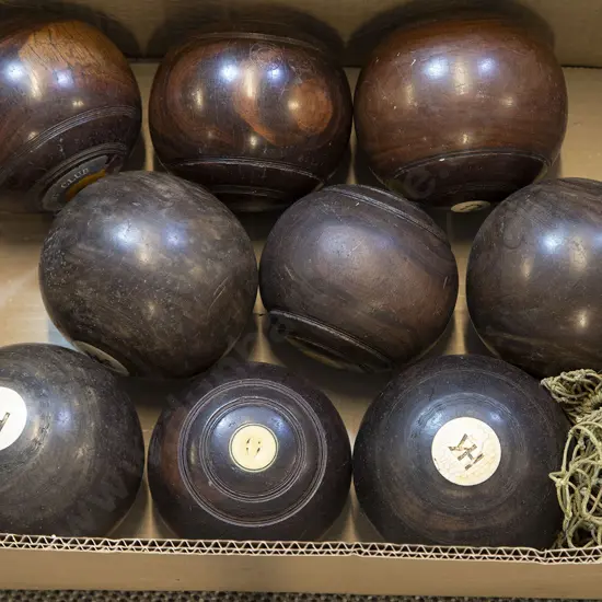Nine Vintage Lawn Bowls
