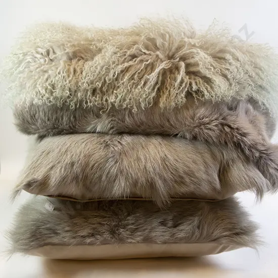 Two Goat Hide Cushions with Goat Hide