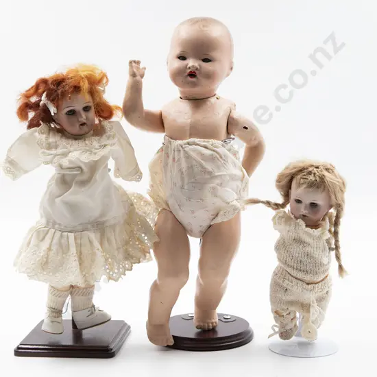 All Composition Baby Doll and Two Bisque Dolls