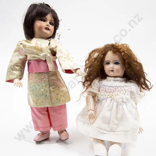 Two New Bisque Character Dolls