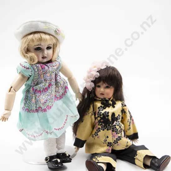 Two New Bisque Character Dolls
