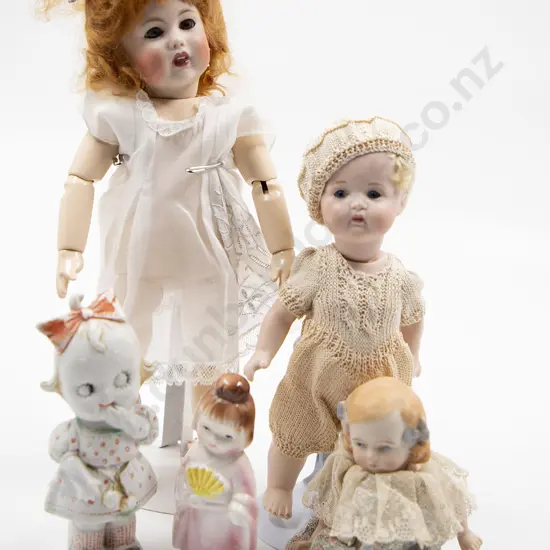 Two New Bisque Character Dolls