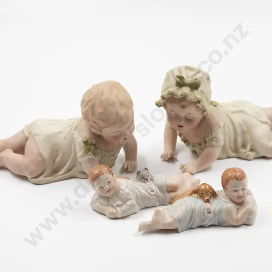 Two Pair New Bisque Piano Baby’s