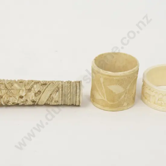 Three Carved Napkin Rings together with other Carved Item