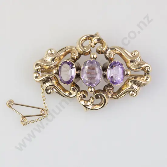 Victorian 9ct Three Stone Amethyst Lozenge Scroll Brooch