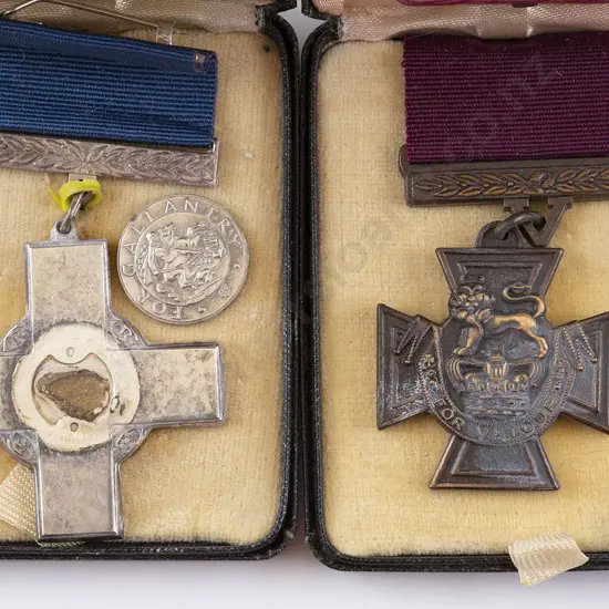 Two Boxed Replica Medals