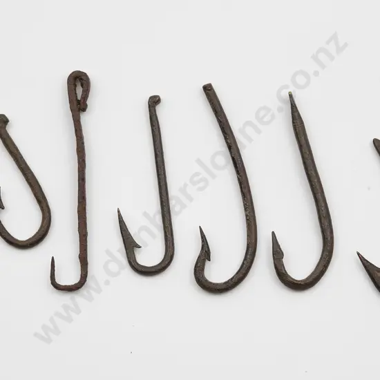 Six copper fish hooks