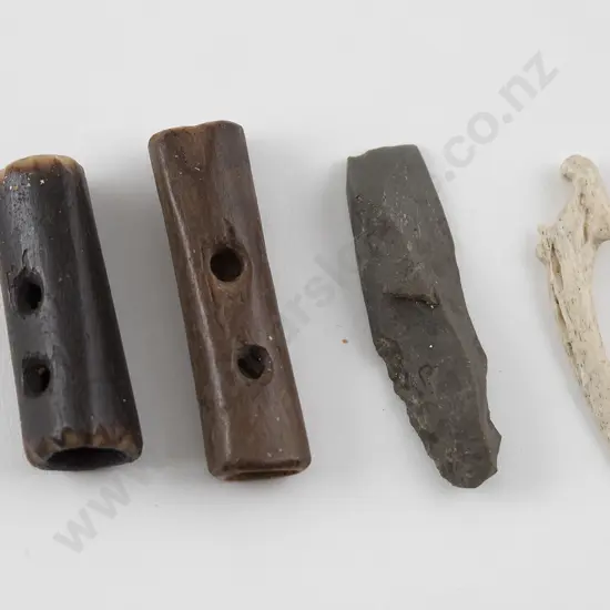 Two Bone toggles, a small chisel and a bone fishhook shank