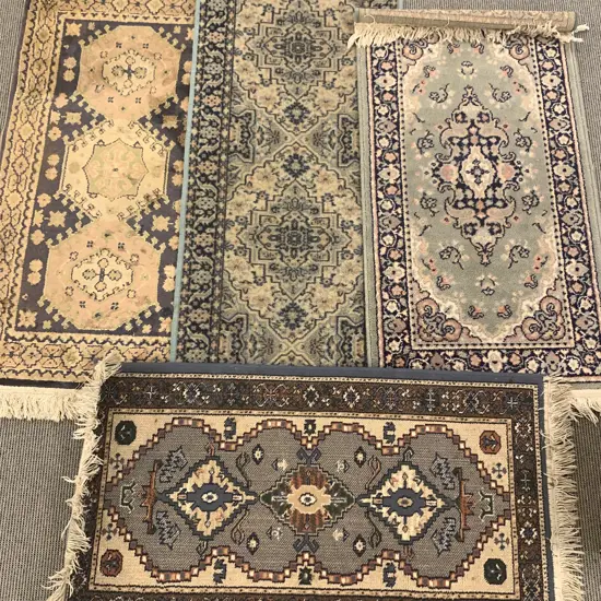 Four Machine Made Persian Style Floor Mats