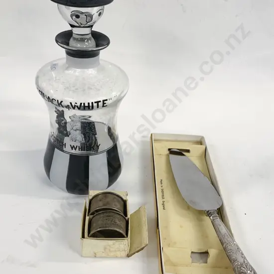 Black and White Scotch Whisky Decanter Together With Pair of Sterling Silver Napkin Rings and Slice