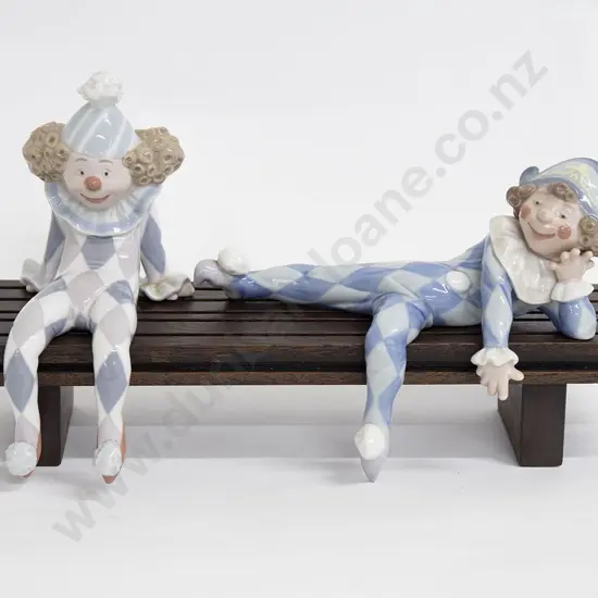 Two Signed Seated Lladro Clowns on Stand