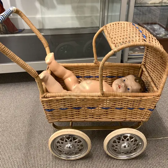 Doll and Wicker Pram