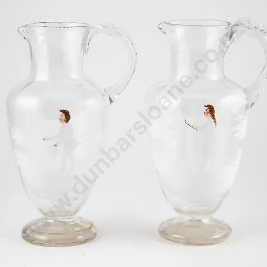Two Mary Gregory Clear Glass Ewers
