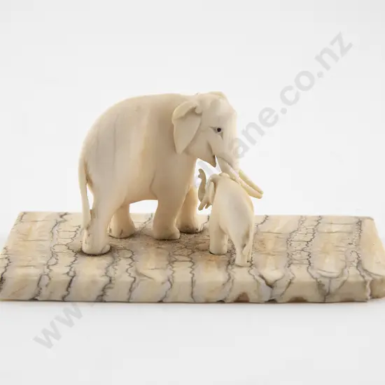 Two Small Carved Ivory Elephants On Mammoth Tooth Base