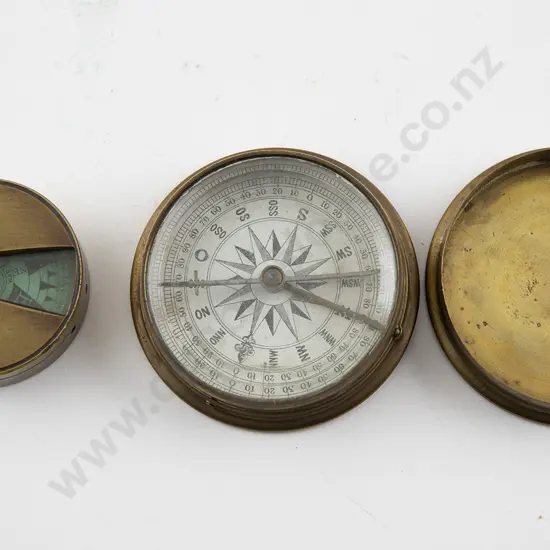 Two Small Circular Brass Cased Compasses