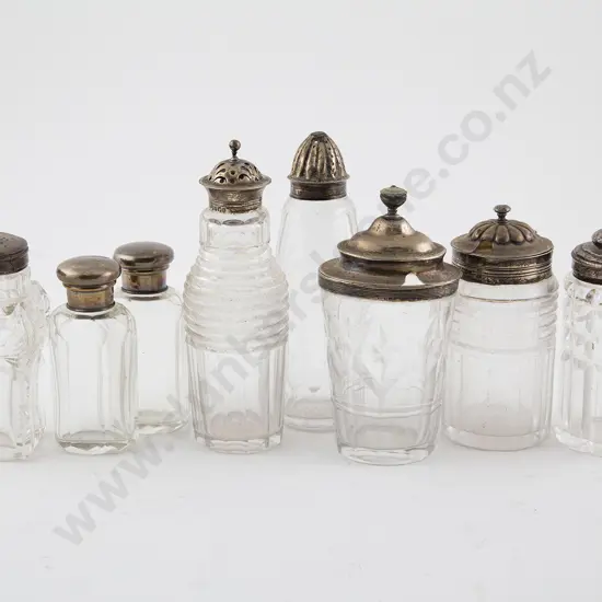 Eight Various Georgian & Later S/S Topped Vanity Bottles
