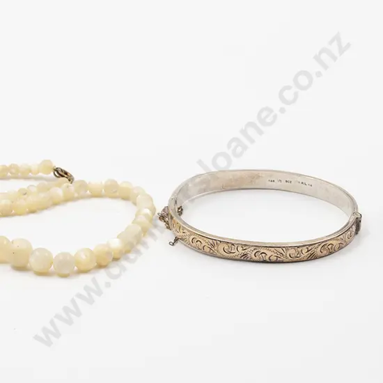 S/S Hinged Half Engraved Bangle