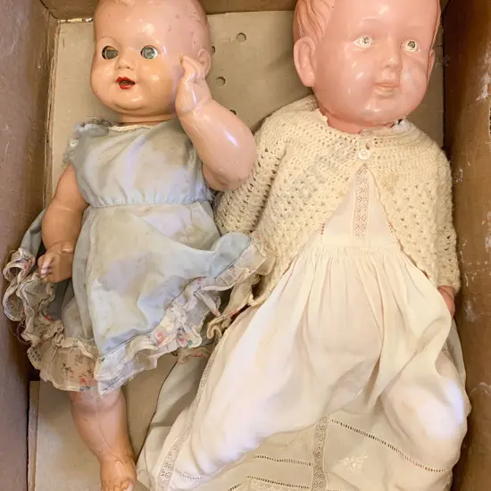 Two Celluloid and Composite Dolls