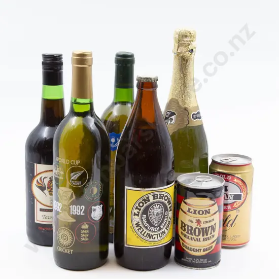 Five Bottles of Beer and Wine Together With Two Cans of Beer