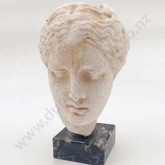 Head Bust on Stone Base