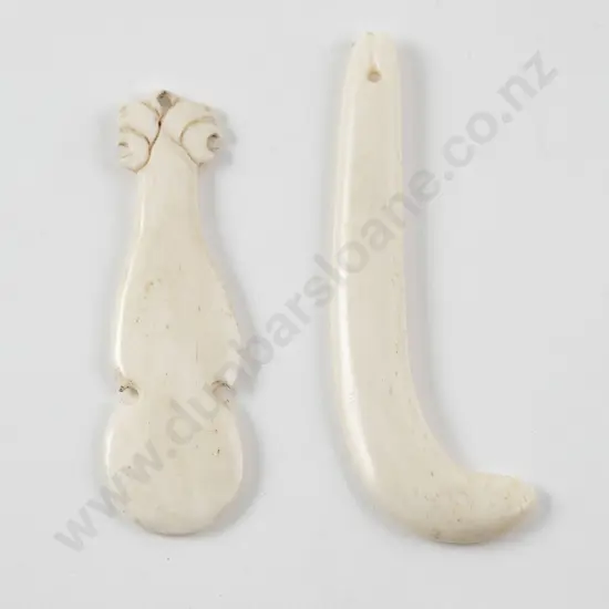 Two bone pendants