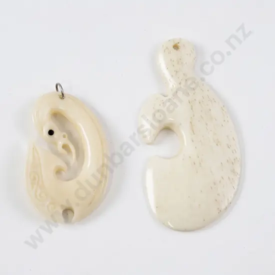 Two bone pendants