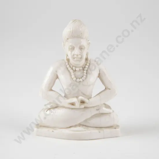 Indian Carved Bone figure of a Meditating Sadhu