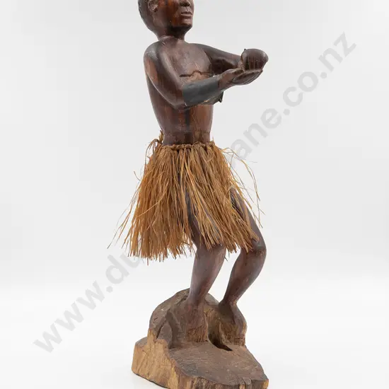 A carved Maori warrior