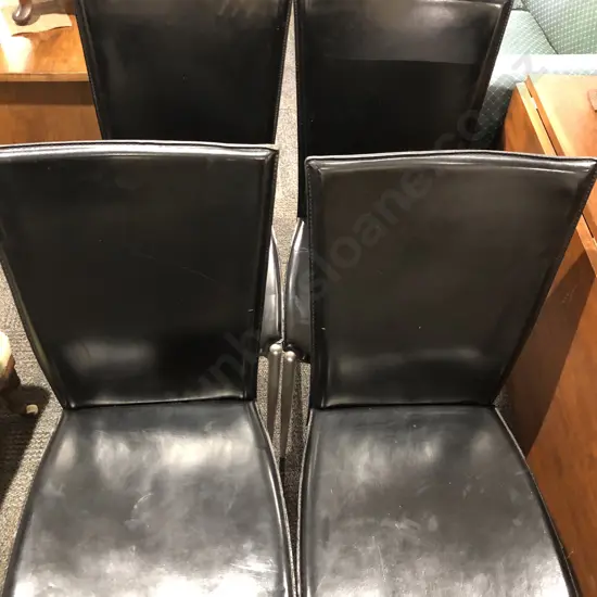 Four Vinyl Upholstered Dining Chairs