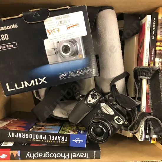 Two Nikon Cameras and One Panasonic Camera Together With Case and Eight Photography Books