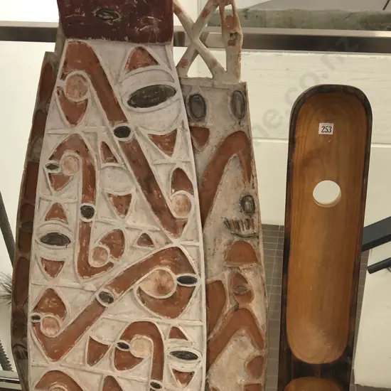 Two PNG Shields Together With Carved Wooden Trough