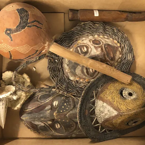 Assorted Tribal Artefacts Including Masks and Percussion Instrument etc.