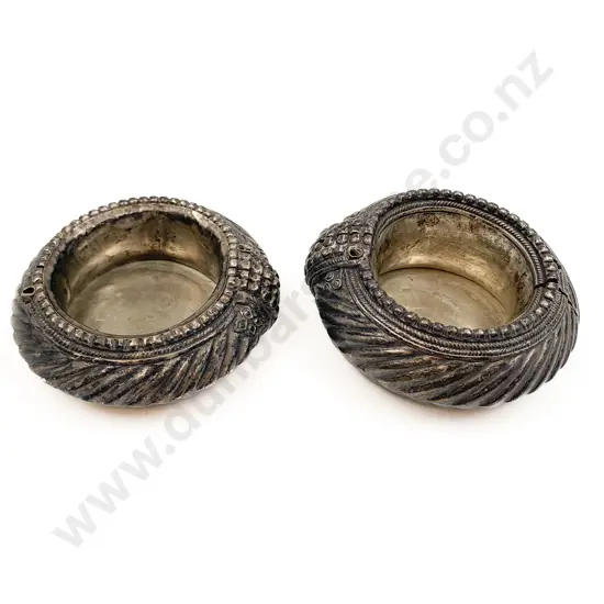 Two African Silver Bracelets as Dishes