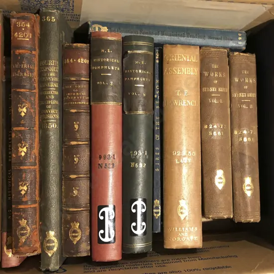 Box of Assorted Leather Bound Books
