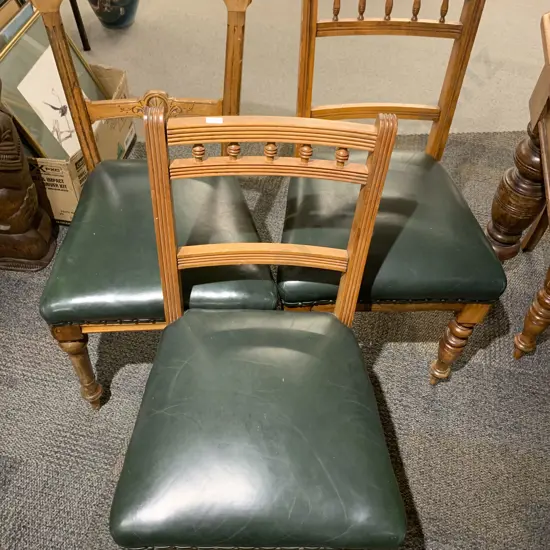 Four Leather Seated and Gallery Backed Kauri Dining Chairs Together with Four Similar Dining Chairs