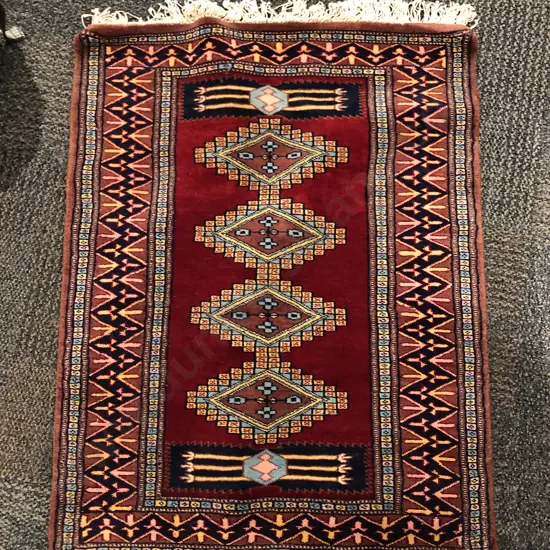 Small Persian Floor Mat on Red Ground