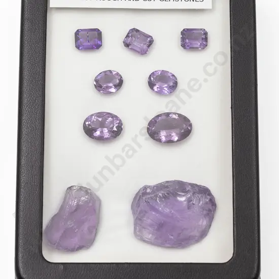 Nine Unmounted Amethyst Gemstones