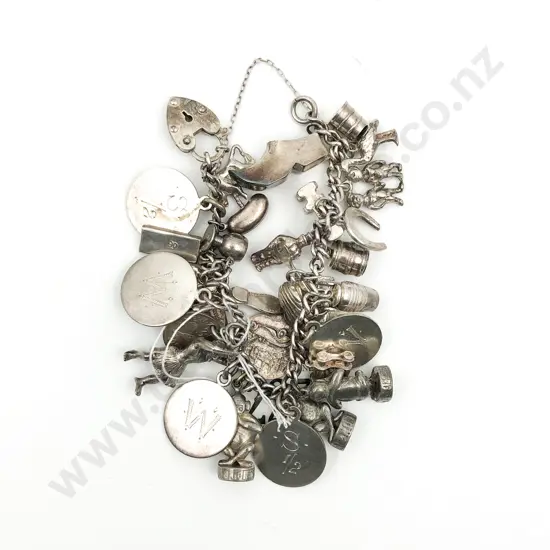 Silver Plate Curb Link Charm Bracelet with 31 mainly s/s charms