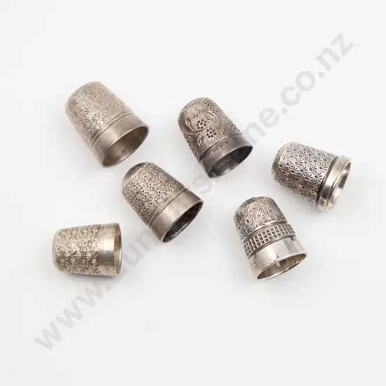 Three S/S Thimbles and four Dorcas thimbles