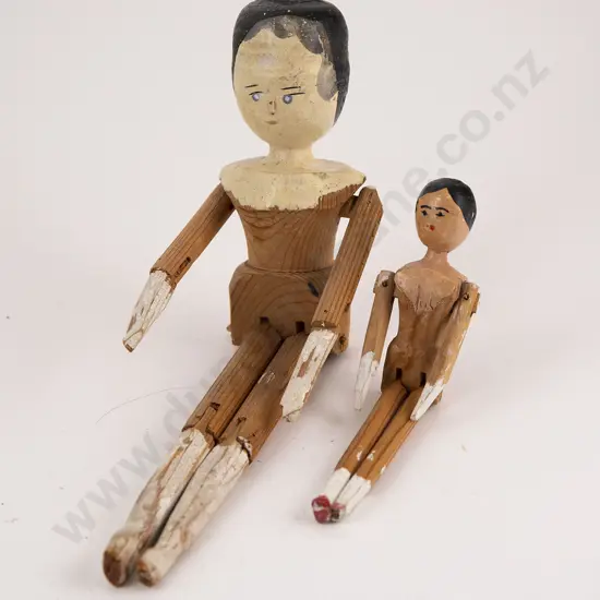 Two Antique Wooden Peg Dolls