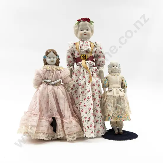 Three China Shoulder Plate Dolls