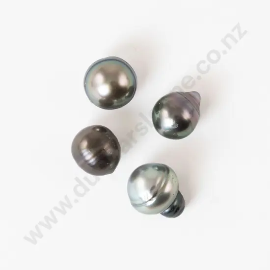 Four Unmounted South Pacific Black Pearls