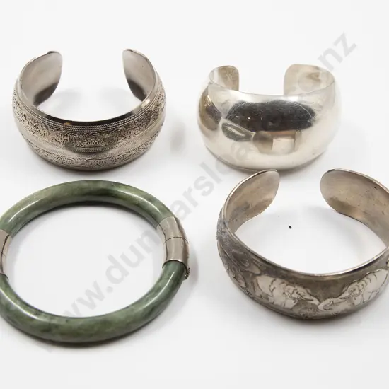 Three Silver Cuff Bangles and Jade Bangle